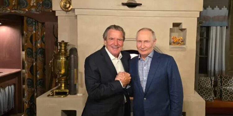 путін відсвяткував день народження із Шредером біля печі та з самоваром